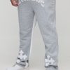 Plus Worldwide Cross Print Flared Gusset Sweatpants